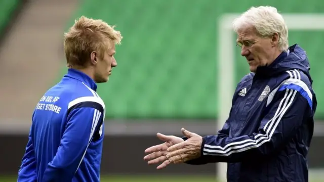 Daniel Wass listens to Denmark manager Morten Olsen