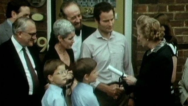 Margaret Thatcher hands over deeds to one of the first council houses bought under the 'Right To Buy' scheme