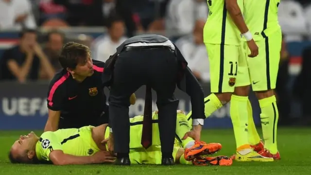 Andres Iniesta receives treatment