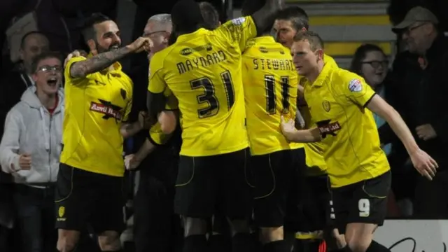 Denny Johnstone celebrates