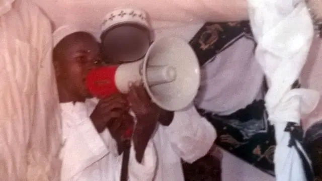 Rashid Mberesero taking part in a Koran recital competition