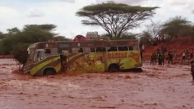 bus in the middle of a river