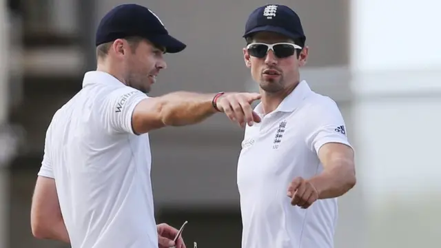 Cook talks with Anderson