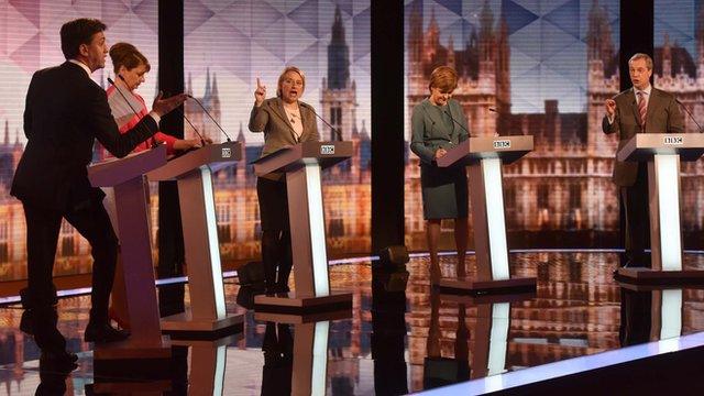 The five leaders standing at their podiums