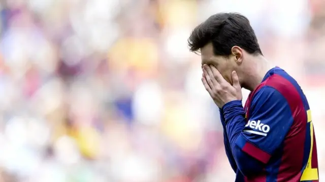 Lionel Messi looks dejected