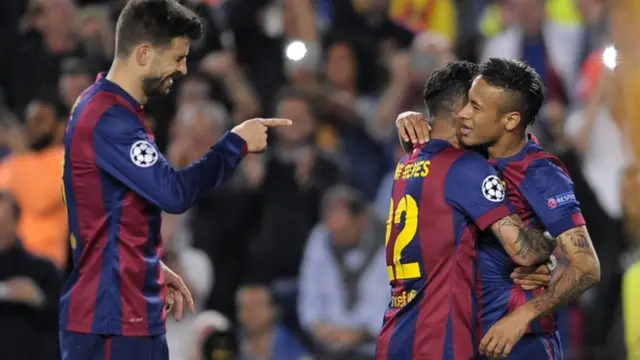 Neymar celebrates with Dani Alves and Gerard pique