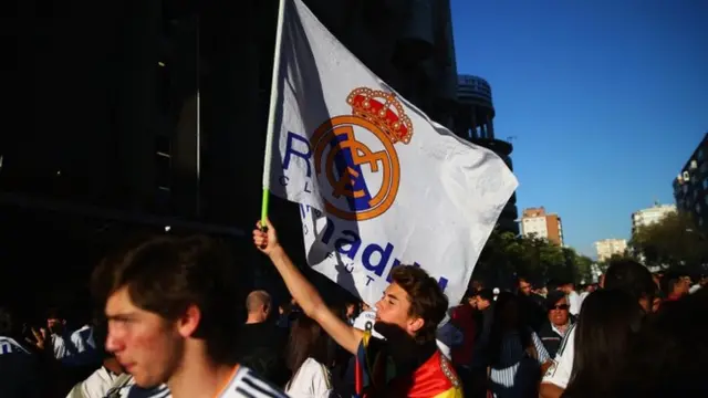 Real Madrid fans with a flag