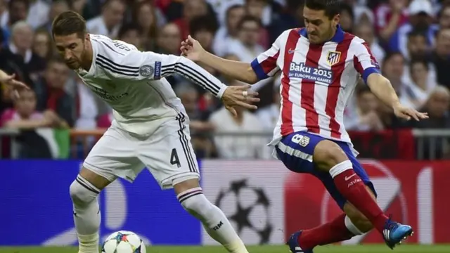 Sergio Ramos holds of Koke