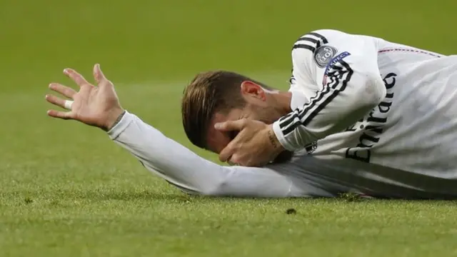 Sergio Ramos holds his face