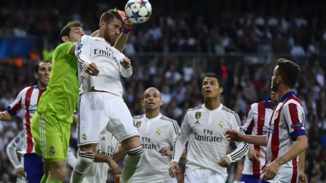 Sergio Ramos heads clear from a corner