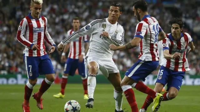 Cristiano Ronaldo runs at Atletico Madrid's defence