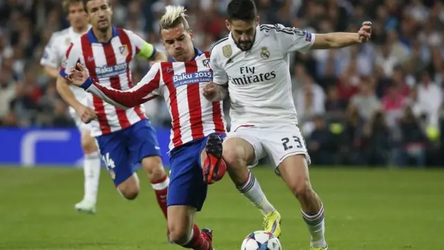 Antoine Griezmann tackles Isco