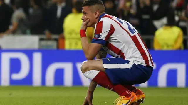 Jose Maria Gimenez looks dejected