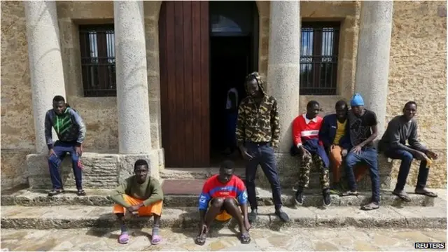 Adolescent migrants are seen at the courtyard of an immigration centre in Caltagirone, Sicily, 18 March 2015