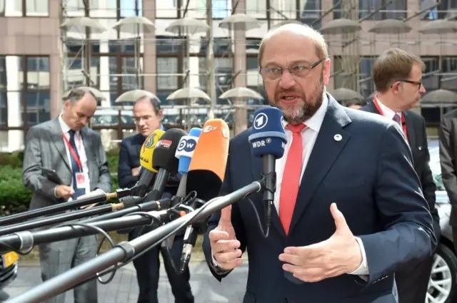 European Parliament President Martin Schulz addresses reporters as he arrives at the European Council headquarters for an extraordinary summit of European leaders to deal with a worsening migration crisis, on 23 April 2015 in Brussels.