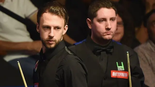 Judd Trump and Stuart Carrington