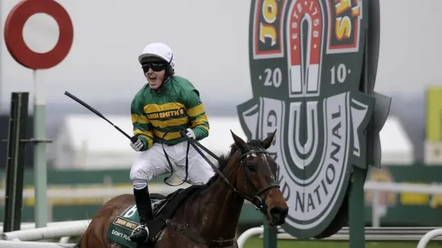 AP McCoy wins the Grand National on Don't Push It