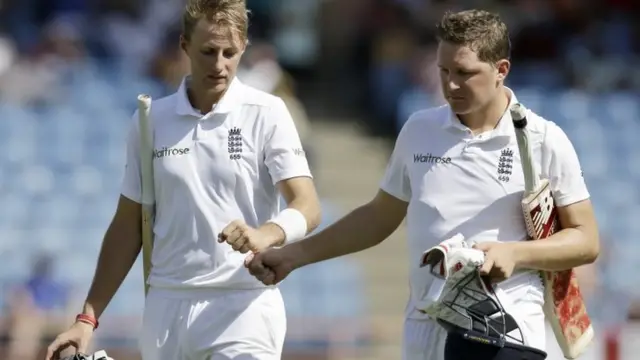 Gary Ballance and Joe Root leave the field