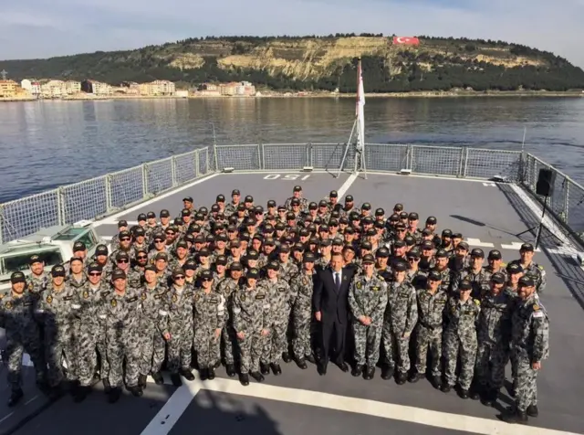 Australian Prime Minister Tony Abbott with personnel of HMAS Anzac