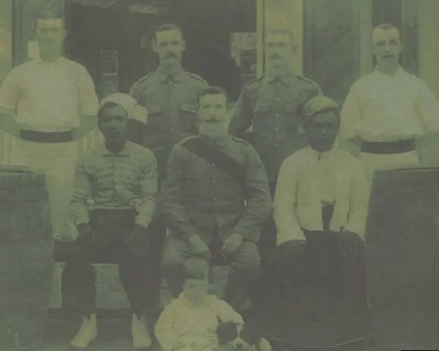 William Percival sitting in the middle, with his son Arthur just in front of him