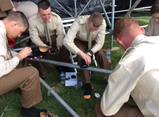 Servicemen shine their shoes ahead of Cape Helles service