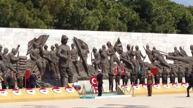 Prince Charles laying a wreath