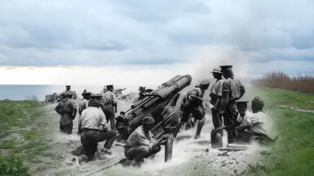 A British 60-pounder heavy field gun in action on a cliff top at Helles Bay, Gallipoli