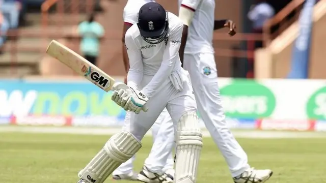 Joe Root reacts as he leaves the field