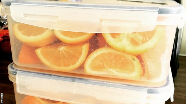 orange slices in containers