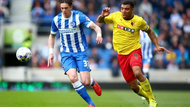 Greg Halford battles with Troy Deeney