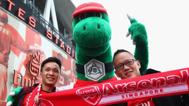 Arsenal mascot with fans