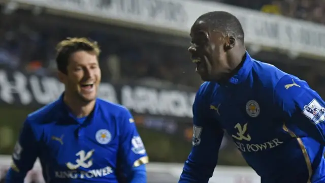 Jeffrey Schlupp (right) of Leicester City celebrates with teammate David Nugent