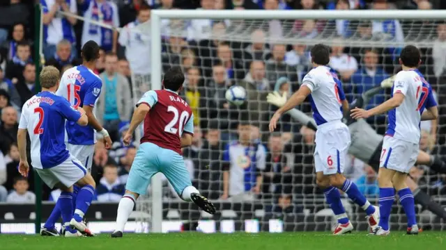 Burnley's Robbie Blake scores against Blackburn in October 2009