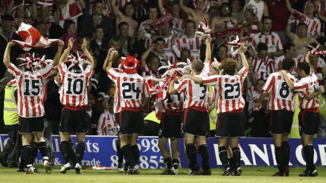 Derry City players celebrate at the end of the UEFA Cup qualification match between Gretna and Derry City