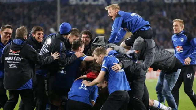 Arminia Bielefeld players celebrate wildly