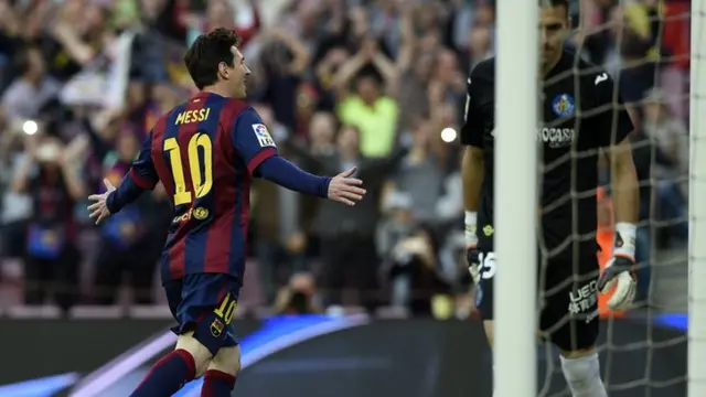 Lionel Messi celebrates for Barcelona