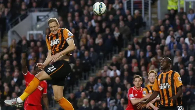 Michael Dawson heads Hull in front