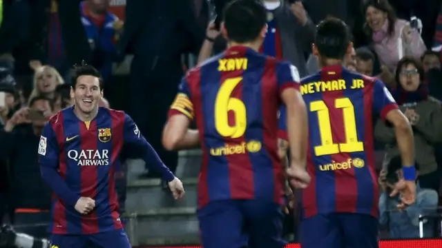 Lionel Messi scores his second