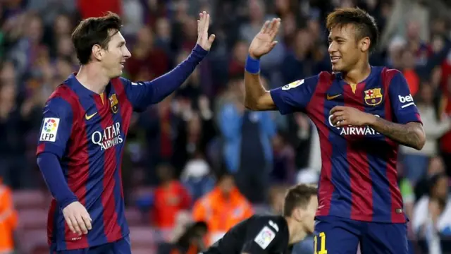 Lionel Messi and Neymar Jr celebrate