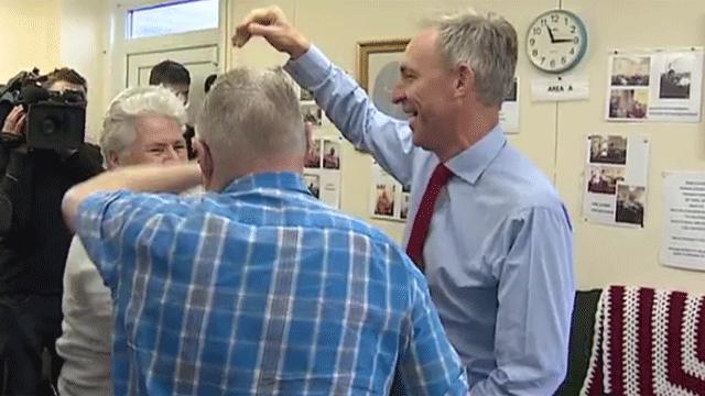 Jim Murphy dances with pensioners in Yoker