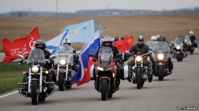 Members of the Russian Night Wolves Motorcycle Club ride to the Mount of Glory memorial complex in the village of Sloboda, some 25 kilometres east of Minsk, to honour Soviet soldiers of WWII, on 26 April 2015.