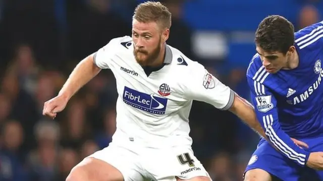 Matt Mills (left) in action against Chelsea's Oscar in the League Cup