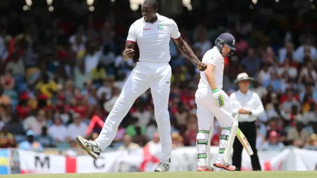 Jason Holder celebrates Ian Bell's wicket