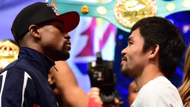 Floyd Mayweather Jr and Manny Pacquiao square up