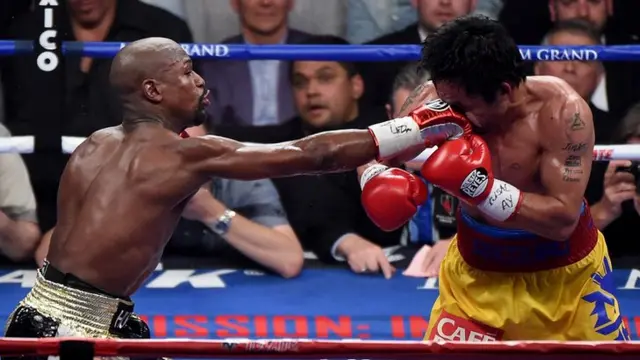 Floyd Mayweather lands a strong right jab