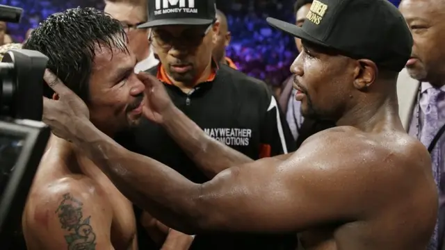 Floyd Mayweather consoles Manny Pacquiao