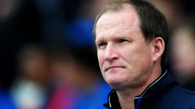 Simon Grayson looks on