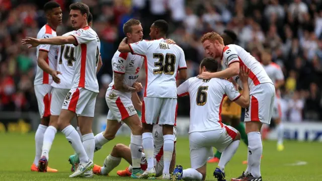 MK Dons celebrate going 3-0 up