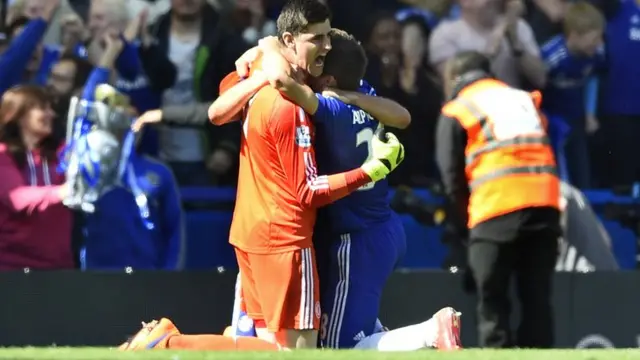 Courtois and Azpiliceuta celebrate winning the title