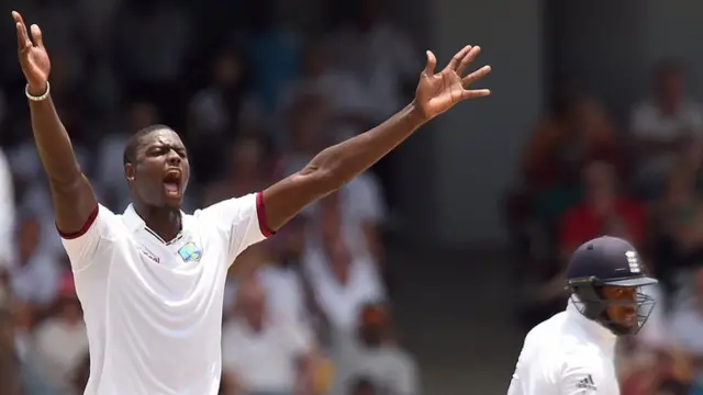 Jason Holder celebrates